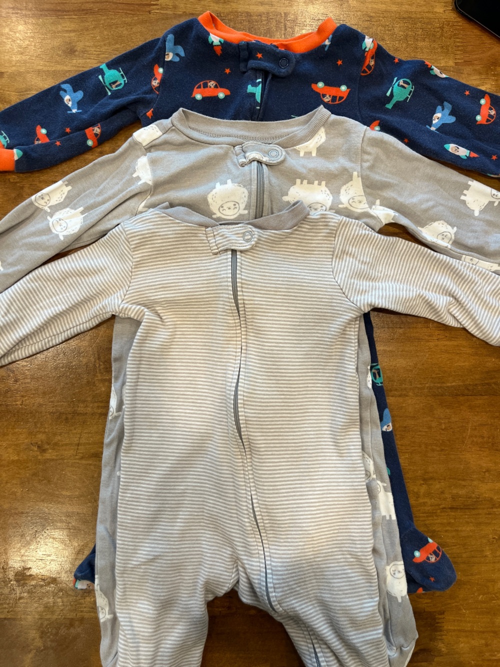 3 Carter’s Footie Pajamas 6-9 Months